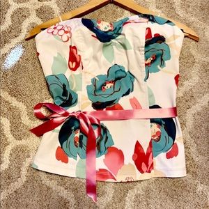 Strapless bustier style, Vintage Authentic Guess top with bow tie at waist.